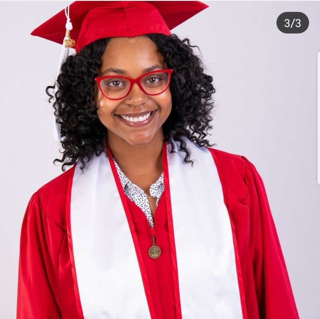 Red cap and gown.
