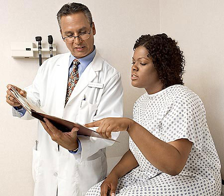 African American female patient with doctor
