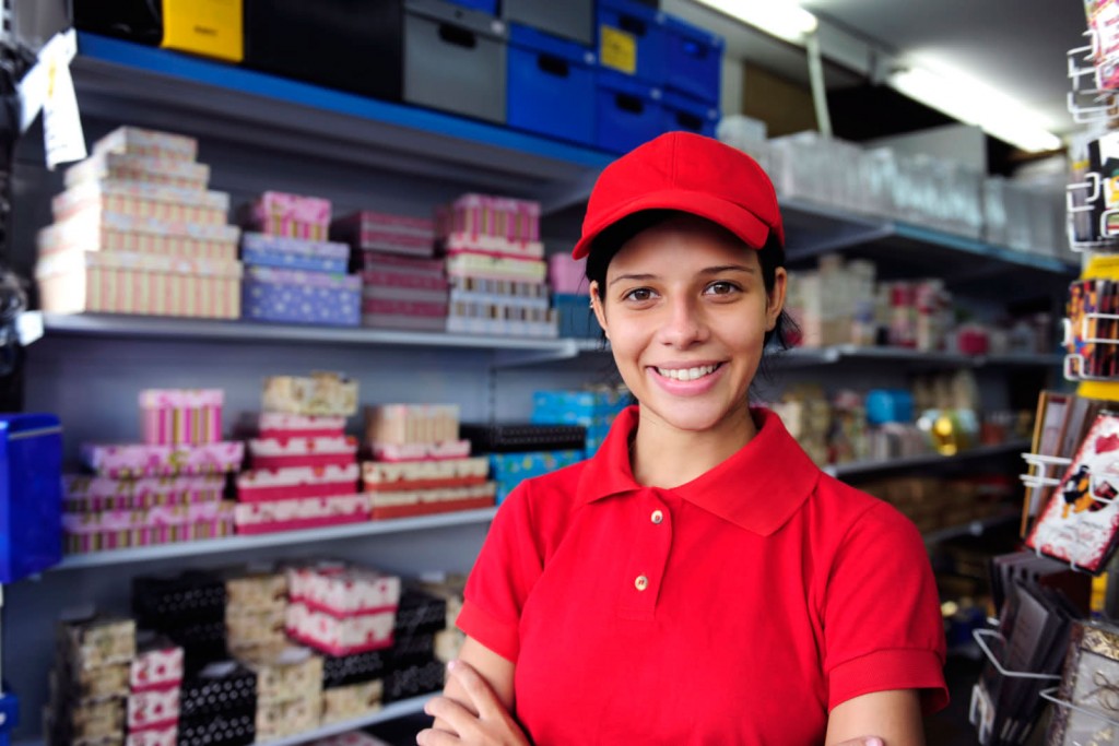 Young Latino worker at store