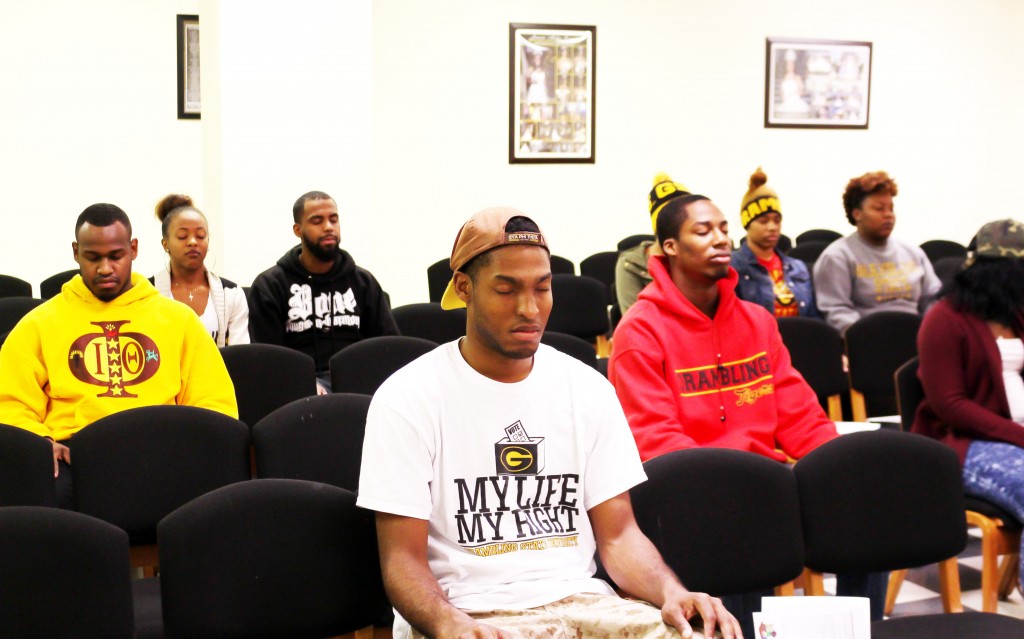 KANESHA DOUGLAS/The Gramblinite Participates close their eyes and meditate to relief stress.