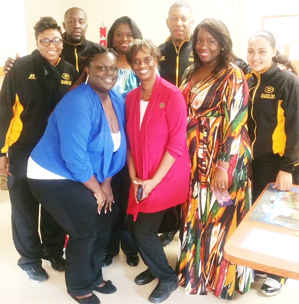 Courtesy photo Coaches of the Lady Tigers basketball team take advantage of a “photo op” with members of the Greater Grambling Chamber of Commerce.
